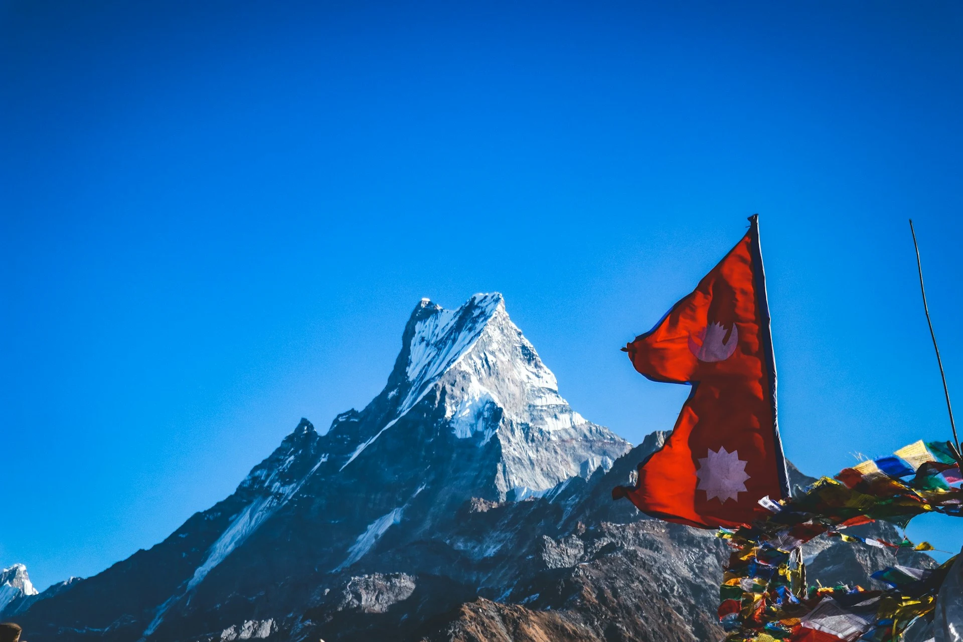 nepal flag with mountain view- facts about nepal